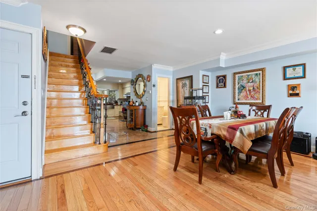 a kitchen with stainless steel appliances granite countertop a stove and cabinets