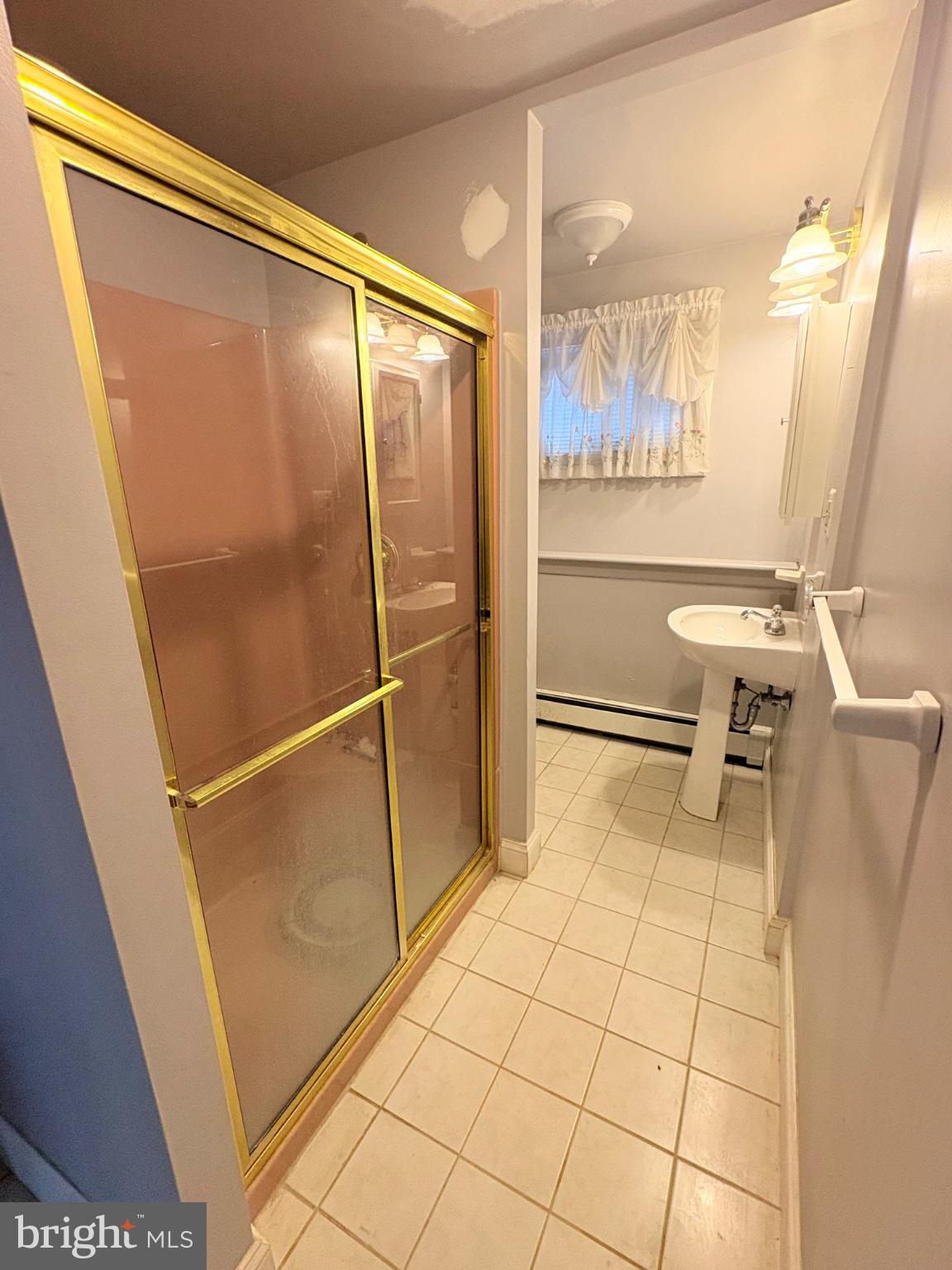 155 Locust Avenue Hamilton, NJ 08610 - Photo 22 of 25 a bathroom with a sink toilet and shower