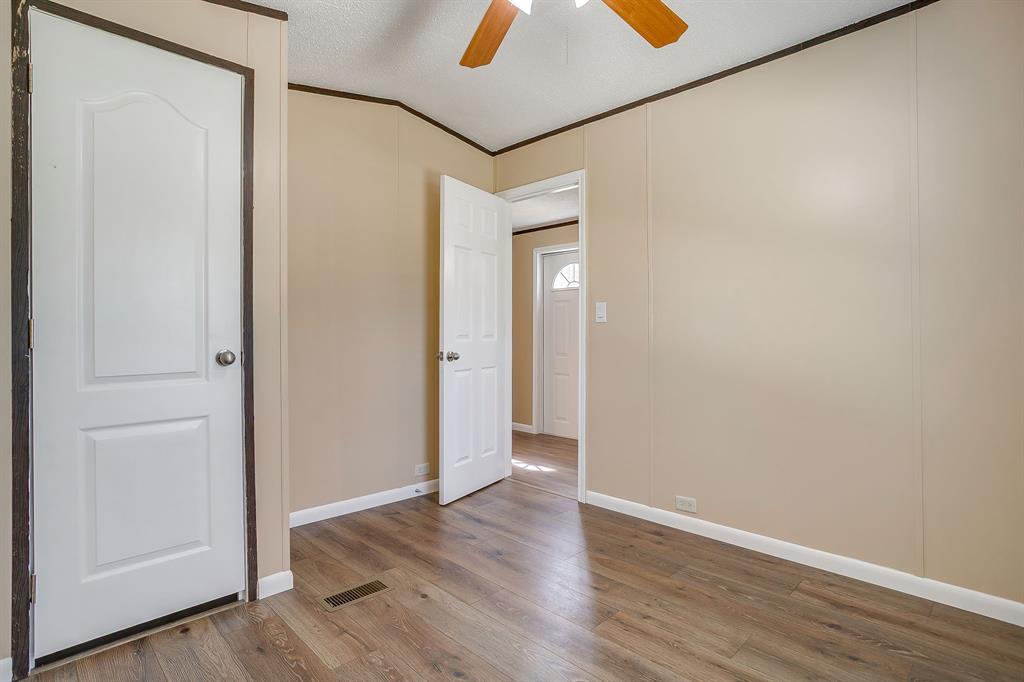 1948 Lariat Lane Burleson, TX 76028 - Photo 21 of 36 a view of a room with wooden floor