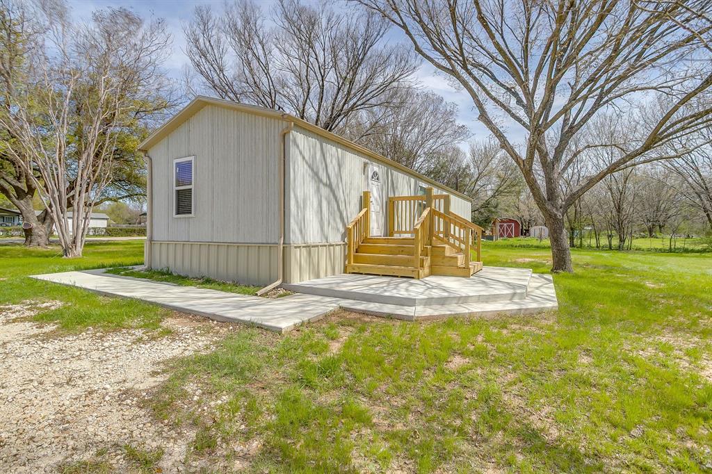 1948 Lariat Lane Burleson, TX 76028 - Photo 28 of 36 a view of back yard with trees
