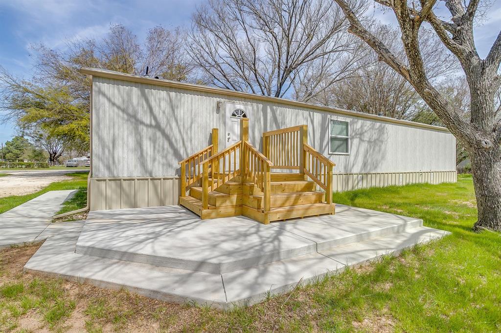 1948 Lariat Lane Burleson, TX 76028 - Photo 29 of 36 a view of backyard with small cabin