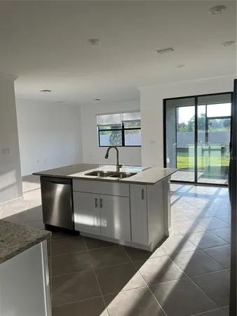 a view of a room with a large window