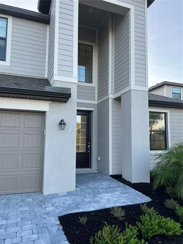 a view of a house with a wooden door