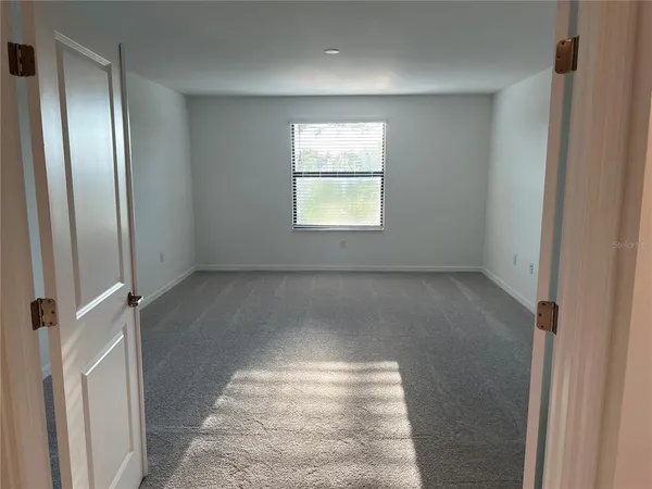 an empty room with a window