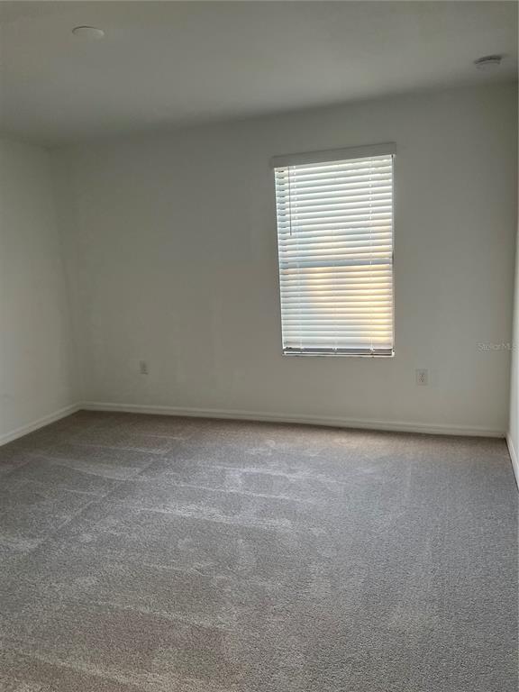 19524 Fishhawk Trail Venice, FL 34293 - Photo 26 of 30 an empty room with a window