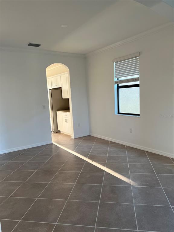 19524 Fishhawk Trail Venice, FL 34293 - Photo 7 of 30 a view of an empty room with a window