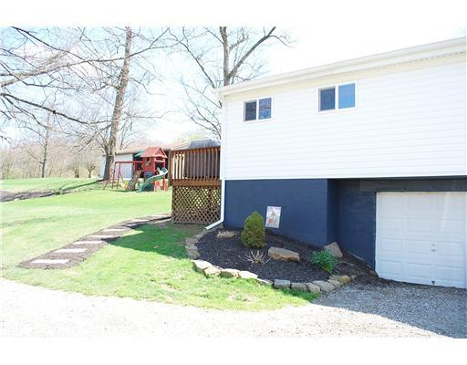 179 Concord Circle Road Beaver Falls, PA 15010 - Photo 18 of 18 Other. Side view of 1 car integral garage and walkway to back deck area.