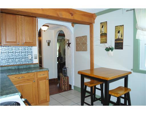 179 Concord Circle Road Beaver Falls, PA 15010 - Photo 5 of 18 Kitchen. View B: Character and charm! Unique tin backsplash, ceiling beams, room for table for two.