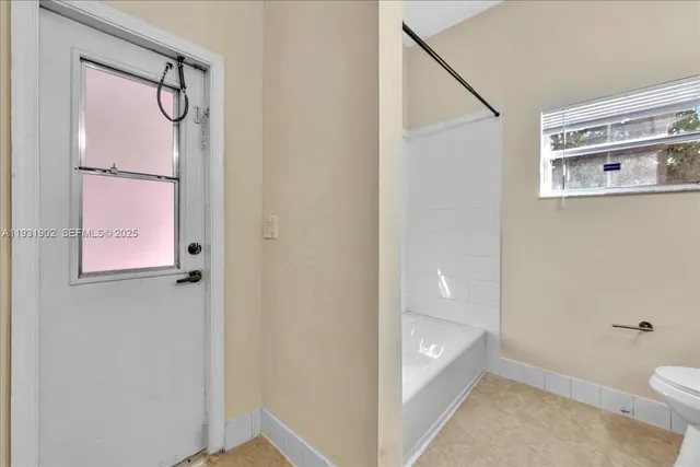 an aerial view of a city with lots of residential buildings