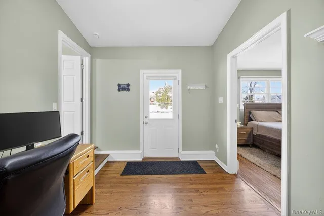 a bedroom with a bed and a view of bedroom