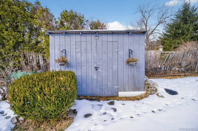a view of a wooden fence