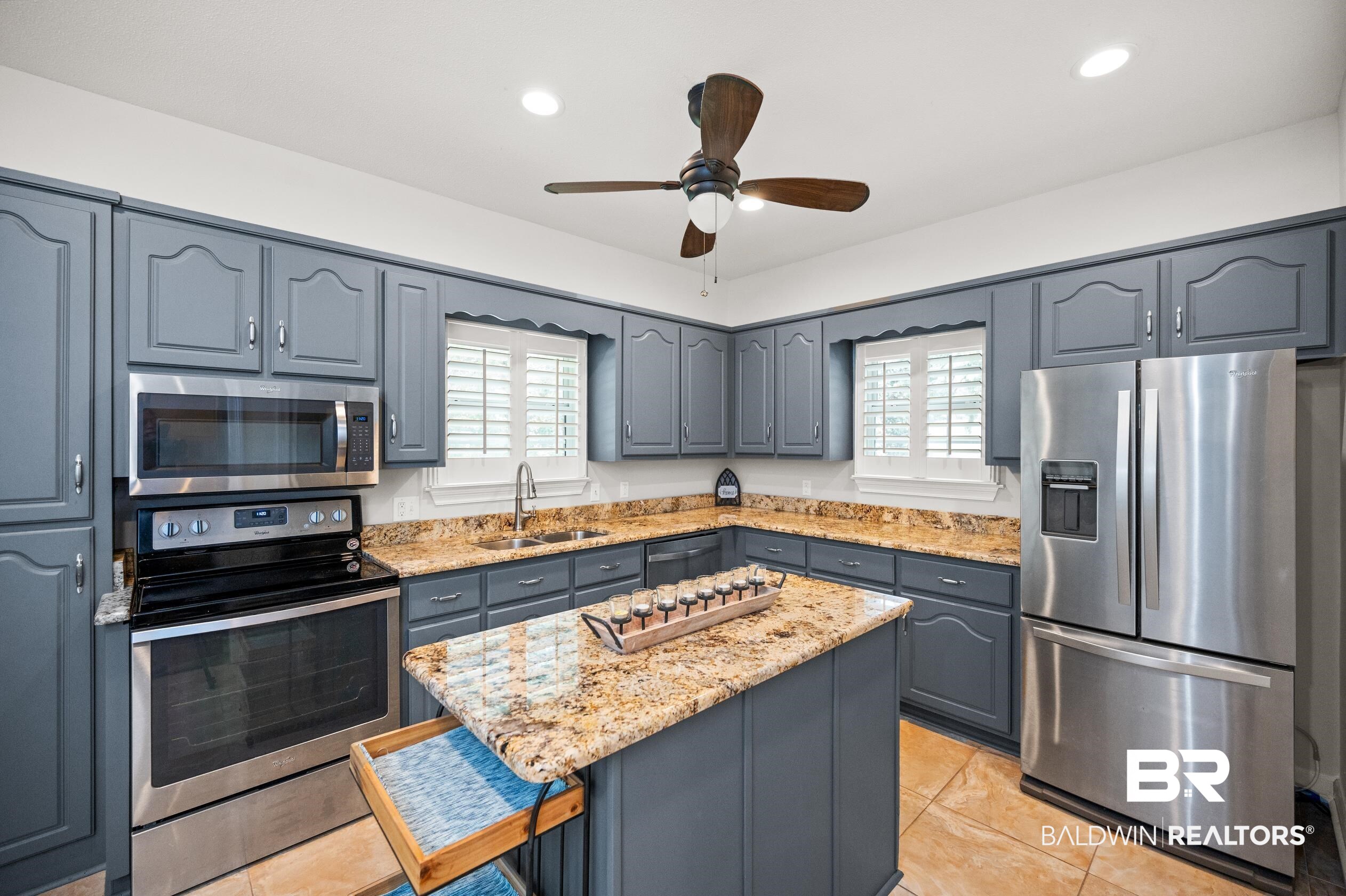 6638 Jackson Square Daphne, AL 36526 - Photo 17 of 62 Kitchen with sink, ceiling fan, plenty of natural light, and stainless steel appliances