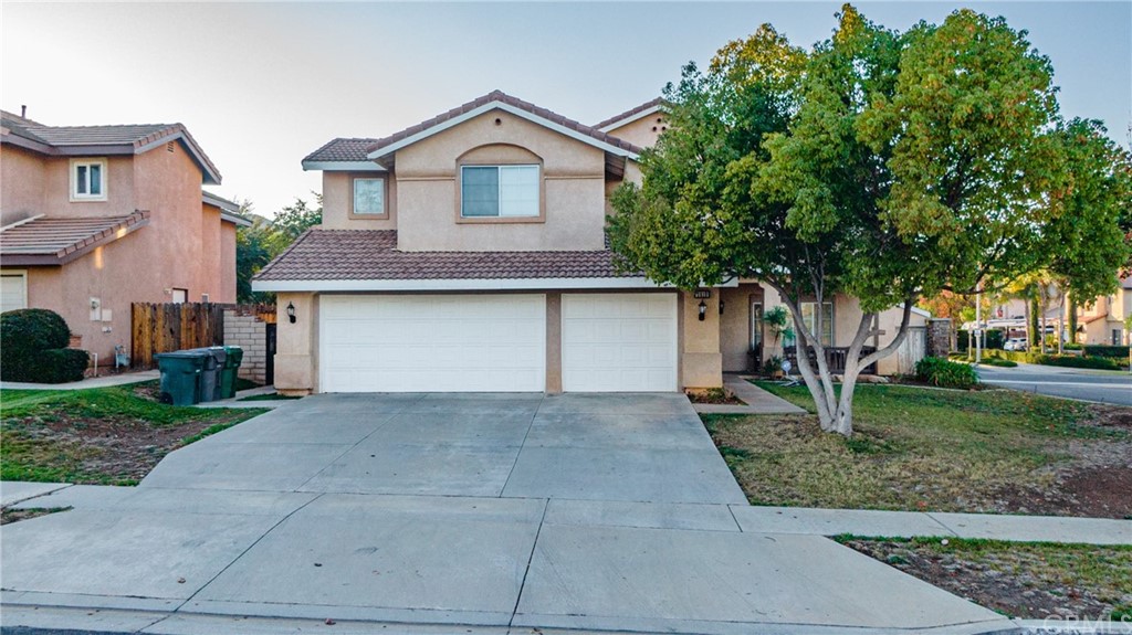 2810 Athens Circle Corona, CA 92882 - Photo 1 of 34 a front view of a house with garden