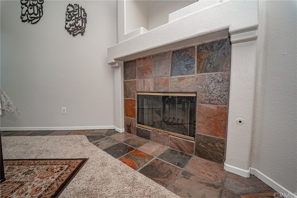 2810 Athens Circle Corona, CA 92882 - Photo 11 of 34 a living room with a fireplace