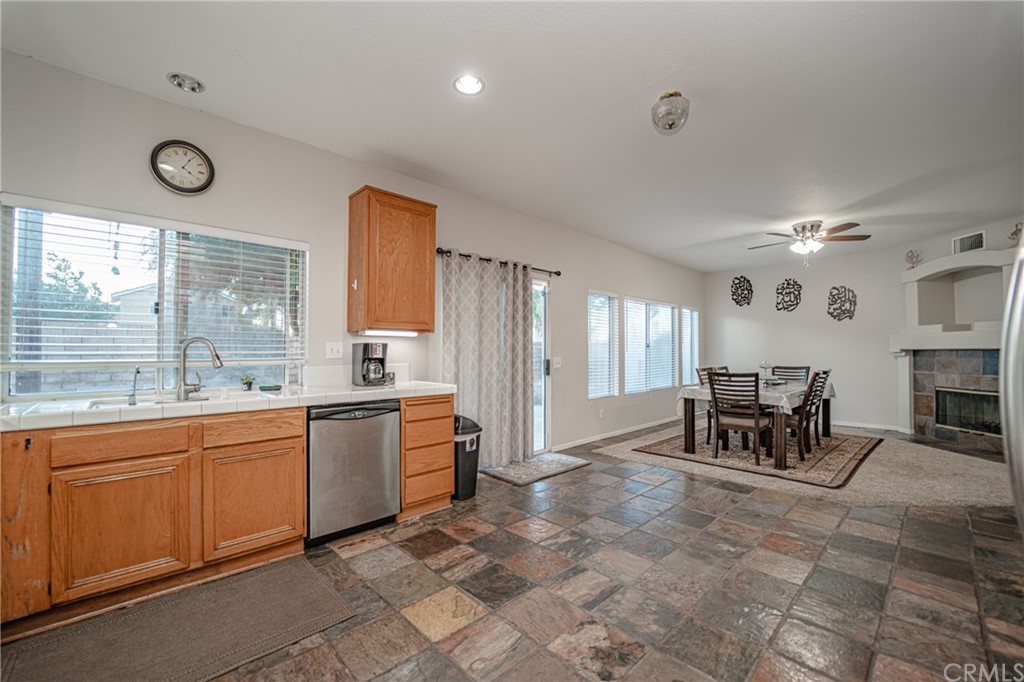 2810 Athens Circle Corona, CA 92882 - Photo 14 of 34 a kitchen with sink cabinets and outdoor view