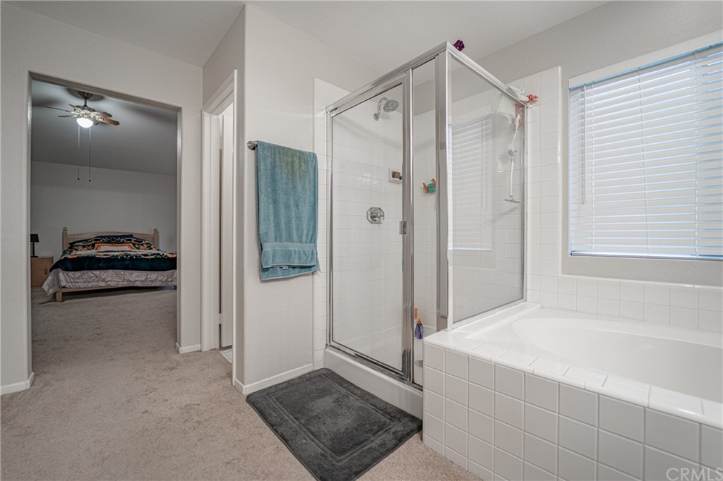 2810 Athens Circle Corona, CA 92882 - Photo 24 of 34 a bathroom with a shower and a tub