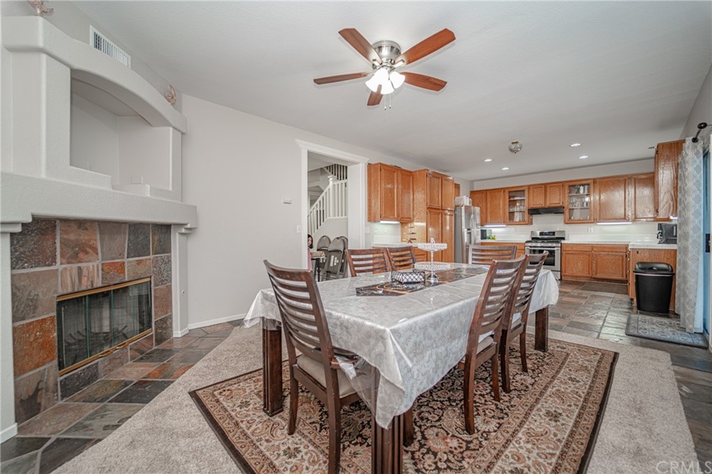 2810 Athens Circle Corona, CA 92882 - Photo 10 of 34 a view of a dining room with furniture