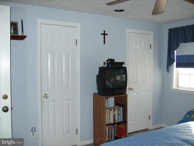 111 Cross Ridge Court Stafford, VA 22554 - Photo 11 of 23 a view of a livingroom with wooden floor and closet