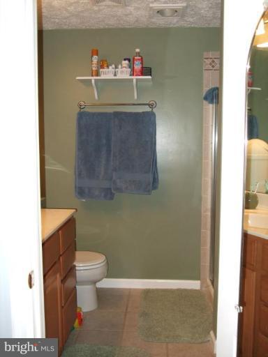 111 Cross Ridge Court Stafford, VA 22554 - Photo 12 of 23 a bathroom with a sink a toilet and bathtub
