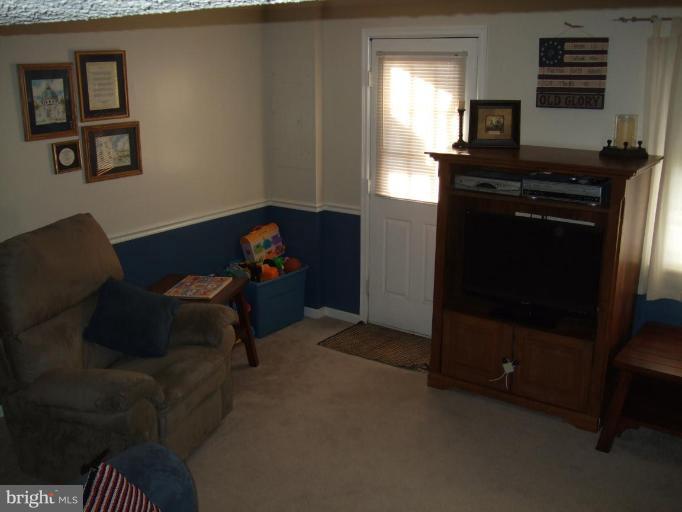 111 Cross Ridge Court Stafford, VA 22554 - Photo 19 of 23 a living room with furniture and a window