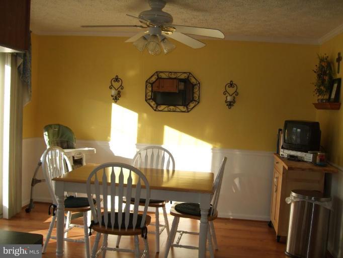 111 Cross Ridge Court Stafford, VA 22554 - Photo 6 of 23 a view of a dining room with furniture and wooden floor