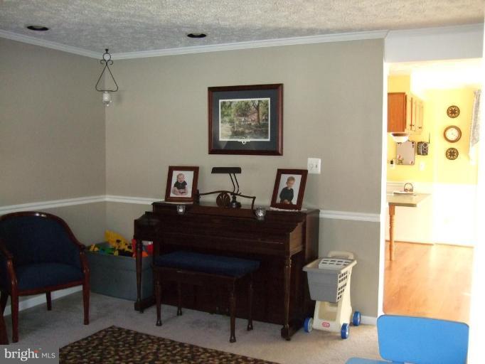 111 Cross Ridge Court Stafford, VA 22554 - Photo 7 of 23 a room with a desk chair and painted walls