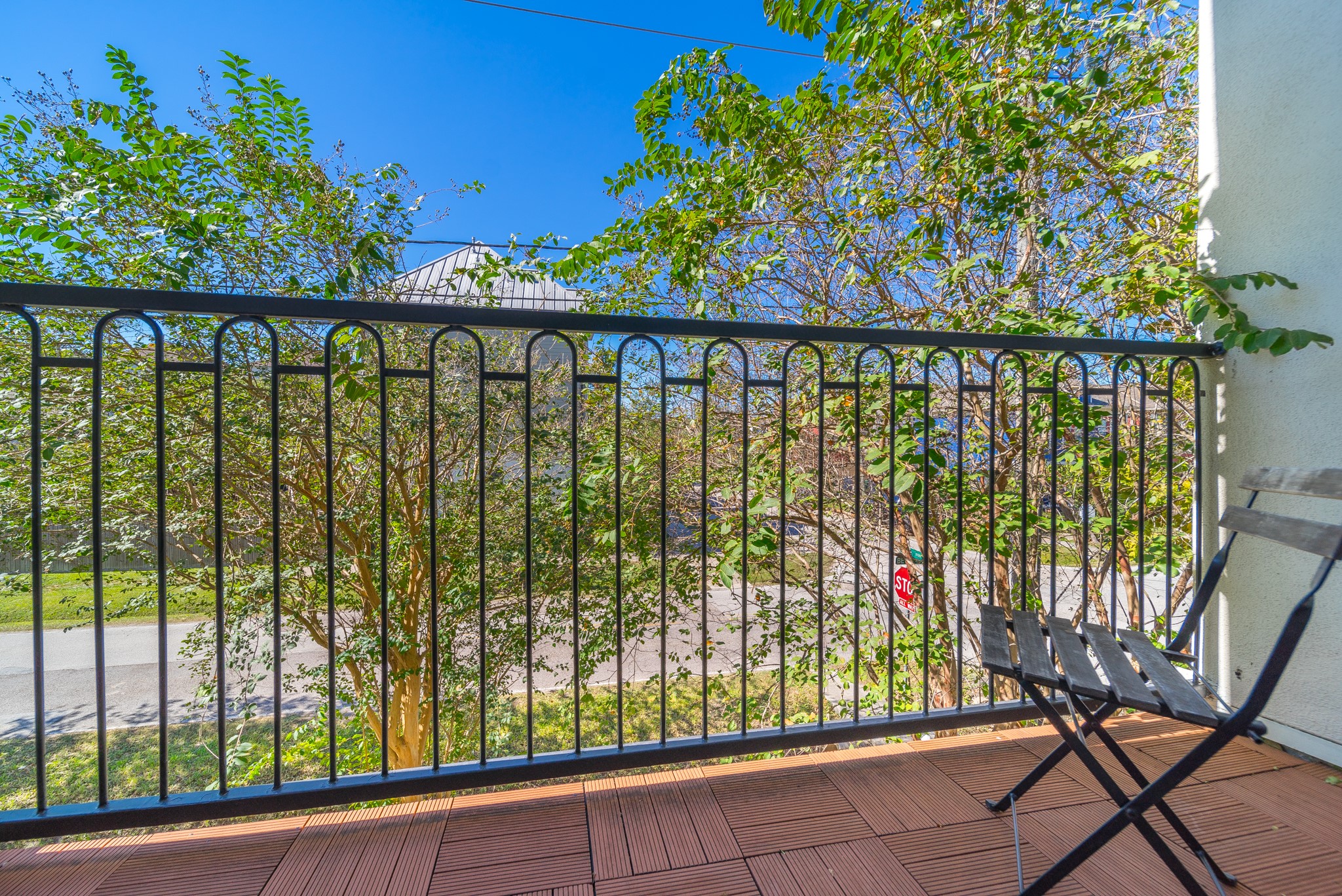 2426 Bevis Street Houston, TX 77008 - Photo 21 of 25 a view of a balcony with wooden floor