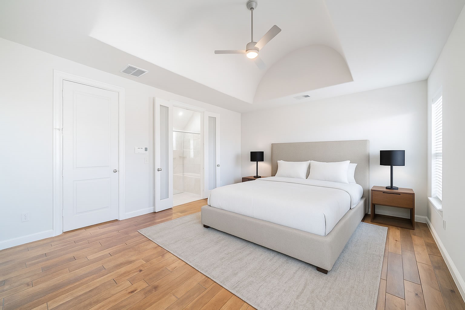 2426 Bevis Street Houston, TX 77008 - Photo 6 of 25 a bedroom with a bed and a night stand