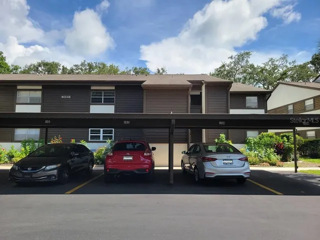 a car parked in front of a house