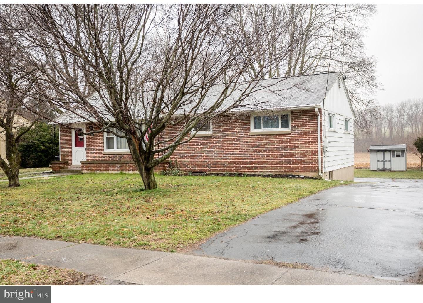 729 Fairmont Road Riegelsville, PA 18077 - Photo 1 of 10 a front view of a house with garden