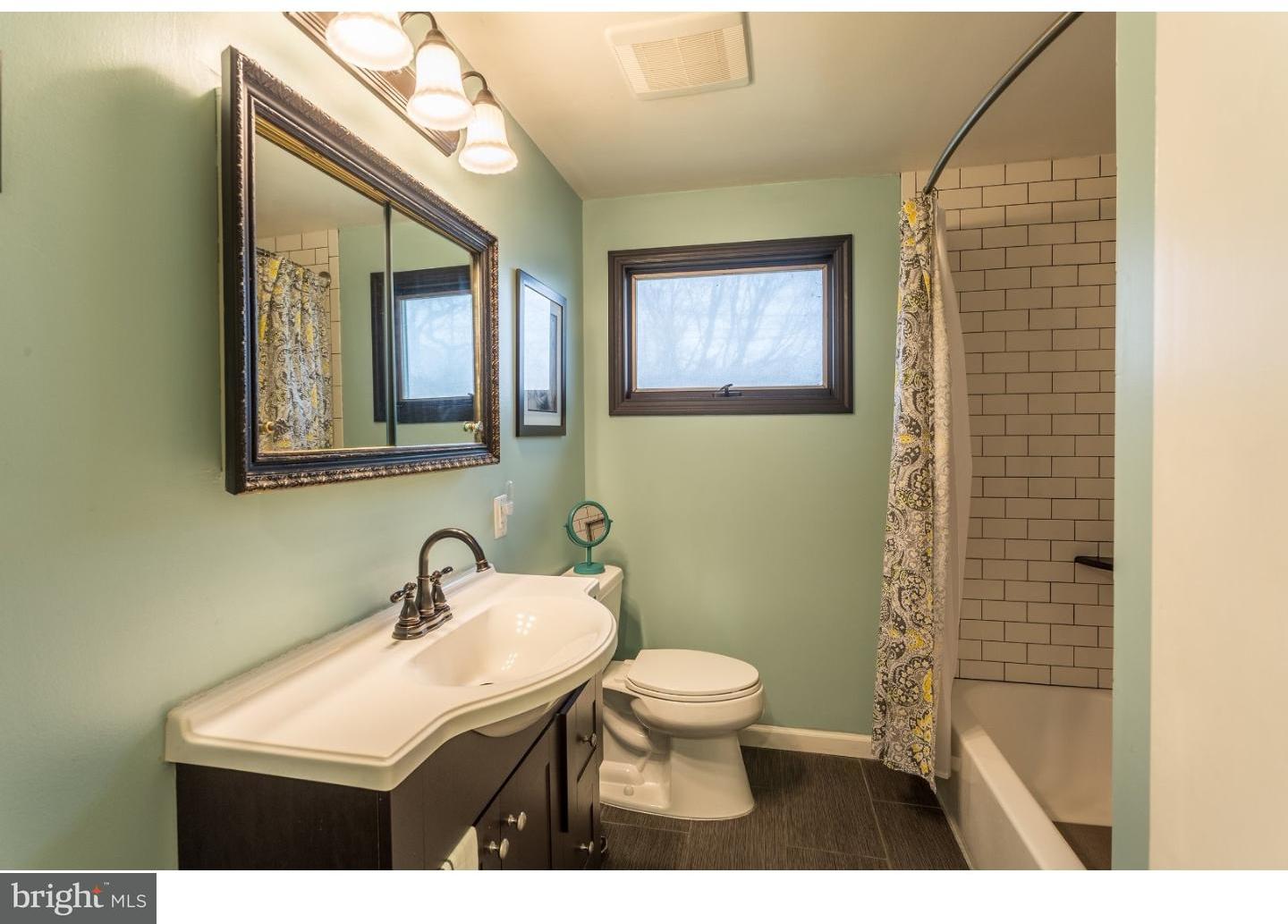 729 Fairmont Road Riegelsville, PA 18077 - Photo 8 of 10 a bathroom with a toilet a sink and mirror