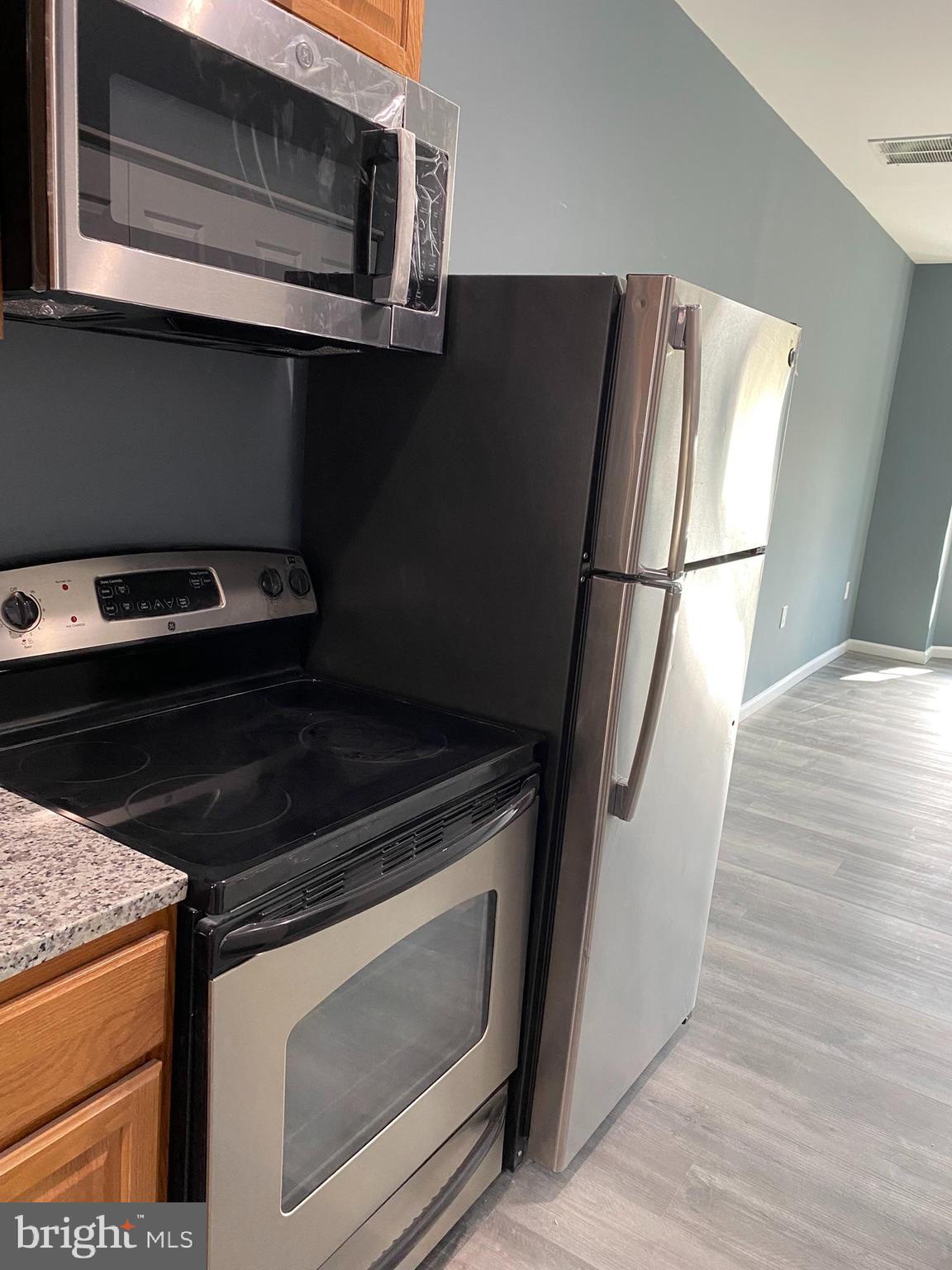 4652 York Road Baltimore, MD 21212 - Photo 12 of 20 a stove top oven sitting inside of a kitchen