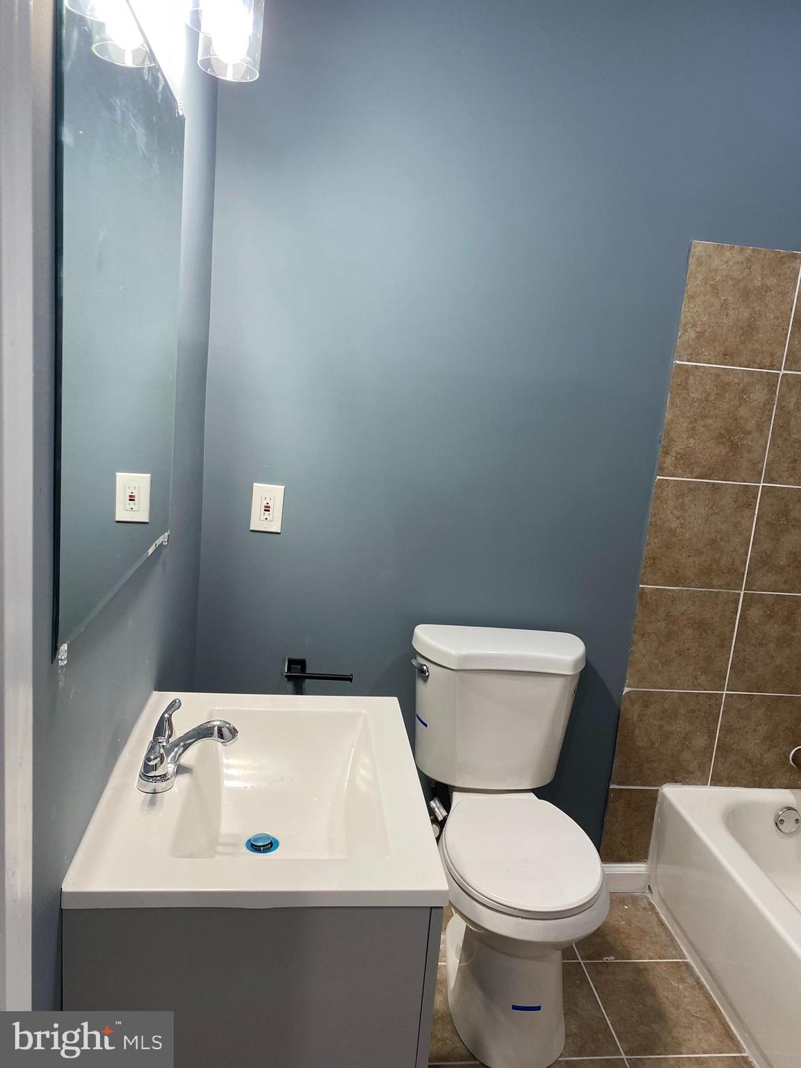 4652 York Road Baltimore, MD 21212 - Photo 16 of 20 a bathroom with a sink and a toilet