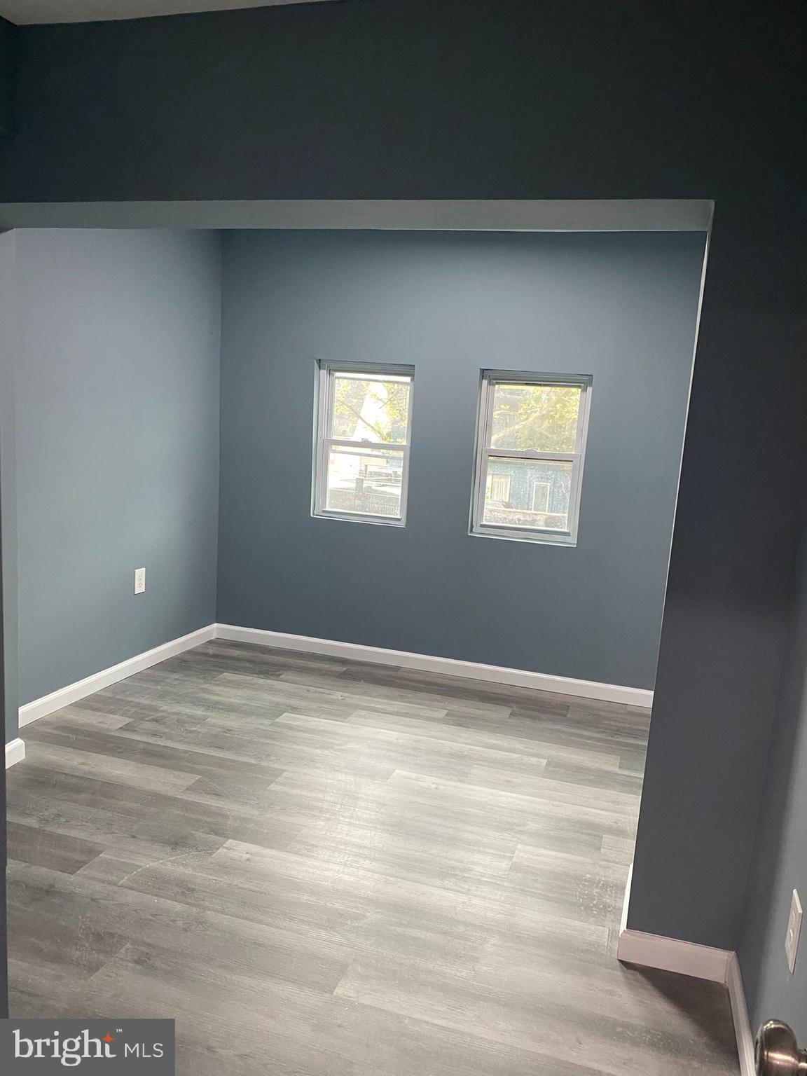 4652 York Road Baltimore, MD 21212 - Photo 19 of 20 a view of empty room with wooden floor and fan