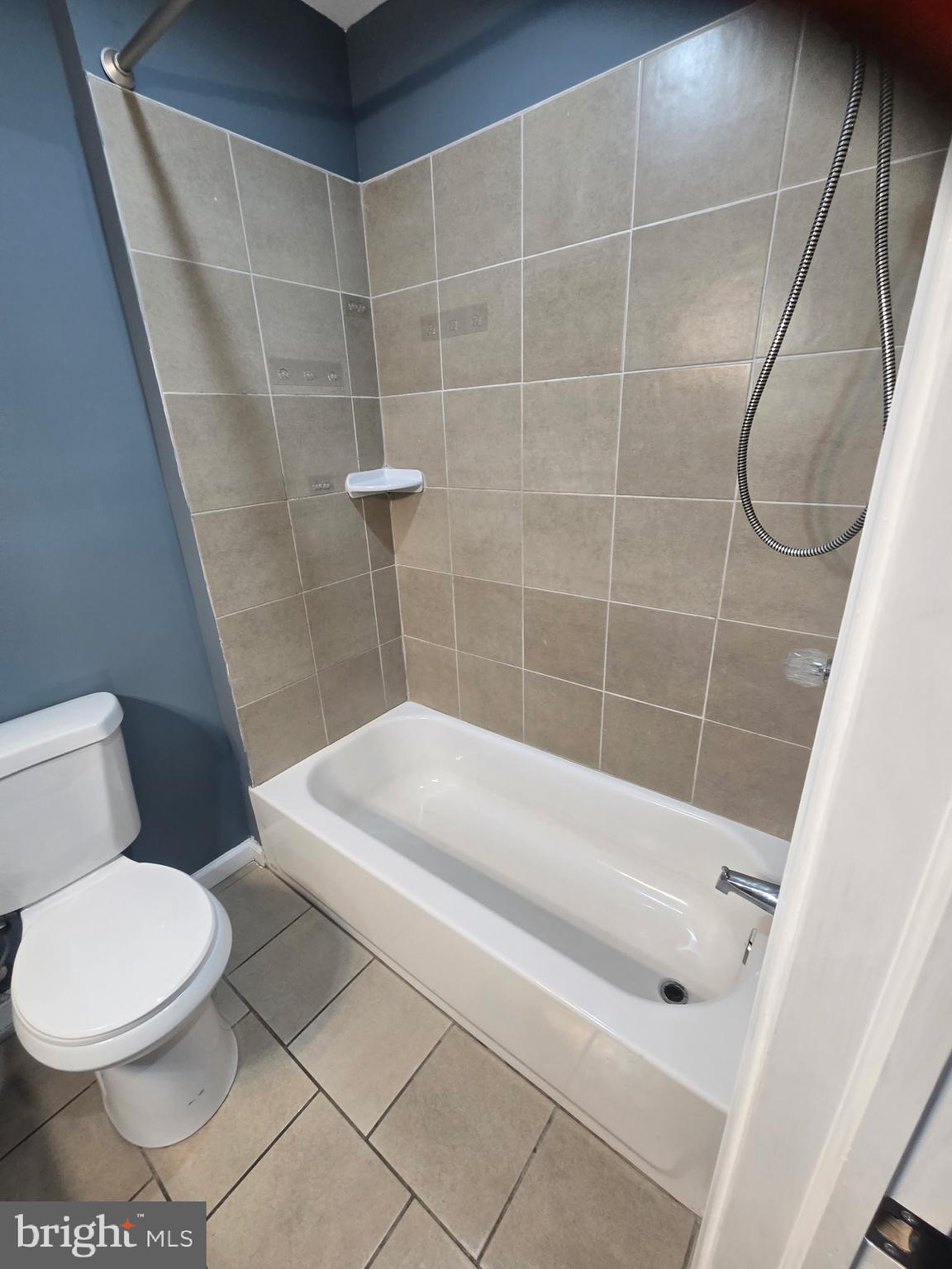 4652 York Road Baltimore, MD 21212 - Photo 8 of 20 a bathroom with a white toilet and shower