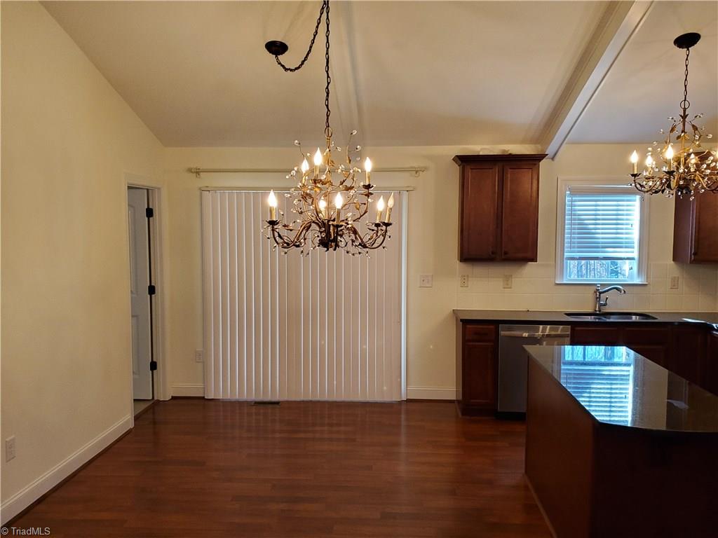 160 Campsite Road Stokesdale, NC 27357 - Photo 5 of 9 Dining Area with Exposed Beams