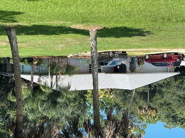 3485 Canaveral Groves Boulevard Cocoa, FL 32926 - Photo 1 of 1 a view of a house with backyard and sitting area