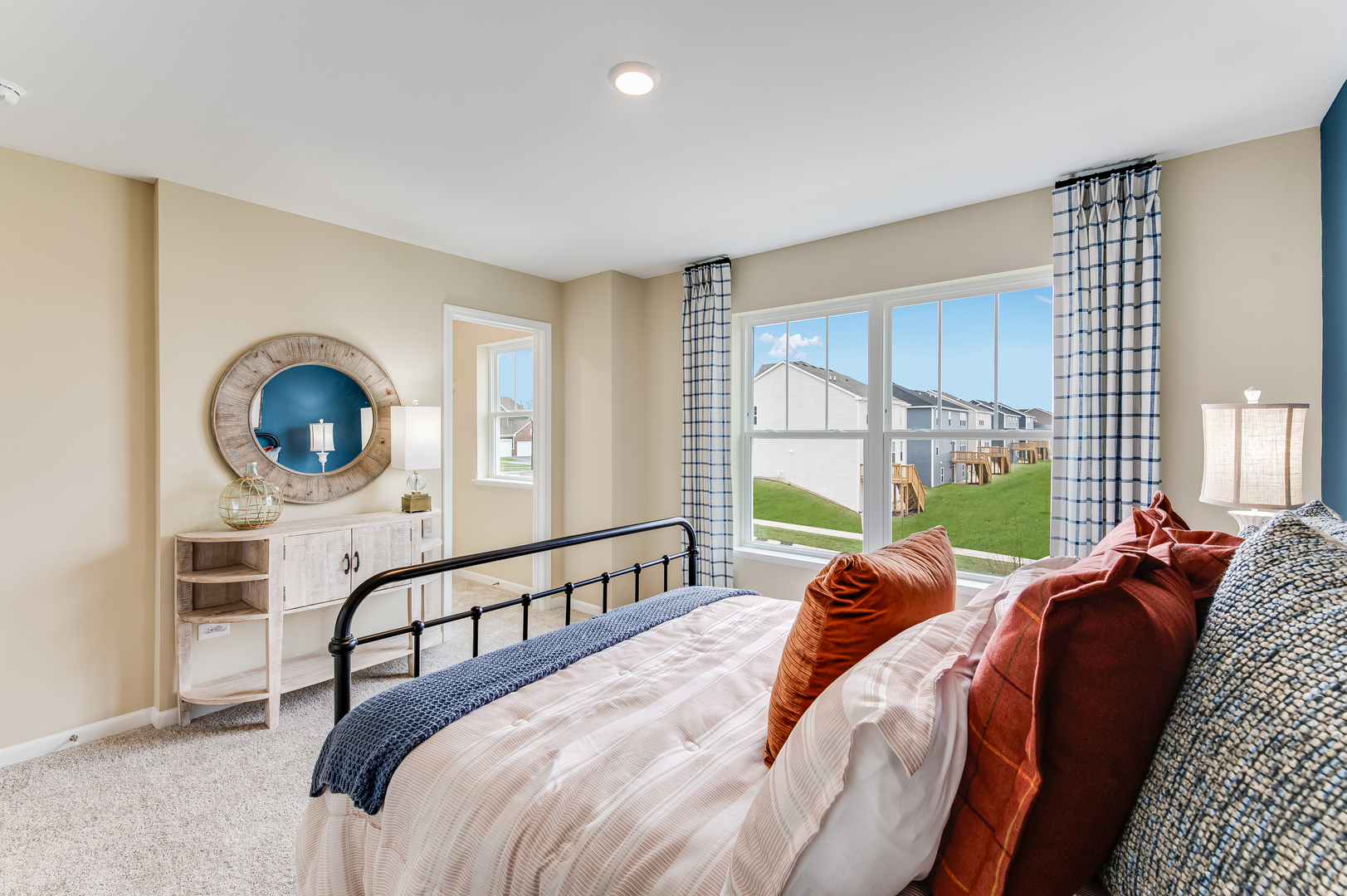 611 Lismore Circle Elgin, IL 60124 - Photo 21 of 24 a bed room with a bed a window and a couch