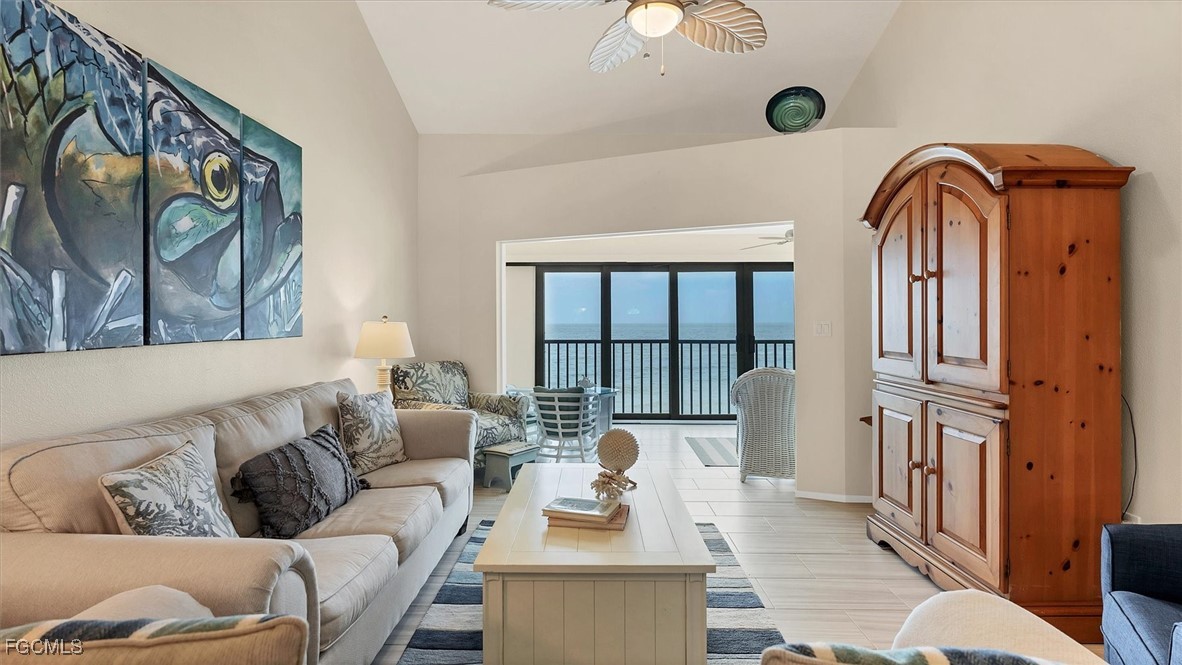 2700 North Beach Road, Unit B205 Englewood, FL 34223 - Photo 12 of 47 a living room with furniture and a window