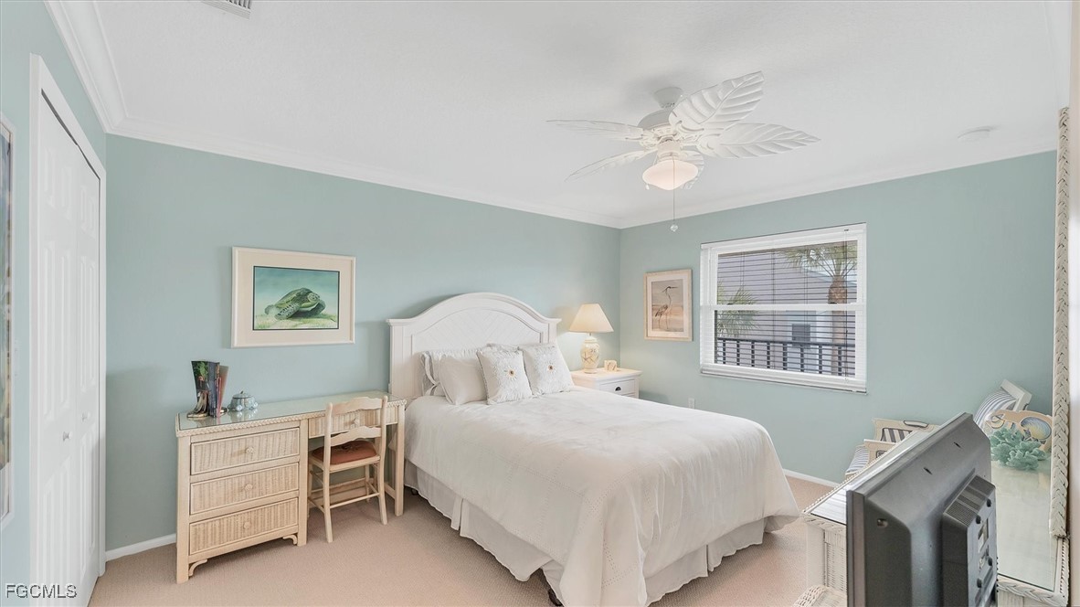 2700 North Beach Road, Unit B205 Englewood, FL 34223 - Photo 28 of 47 a bedroom with a bed and a window