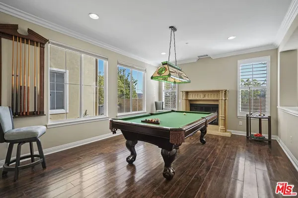 a room with furniture and a wooden floor