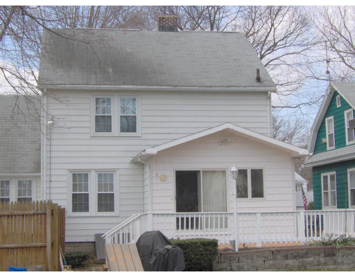 67 Webber Street Springfield, MA 01108 - Photo 9 of 10 a front view of a house with a yard