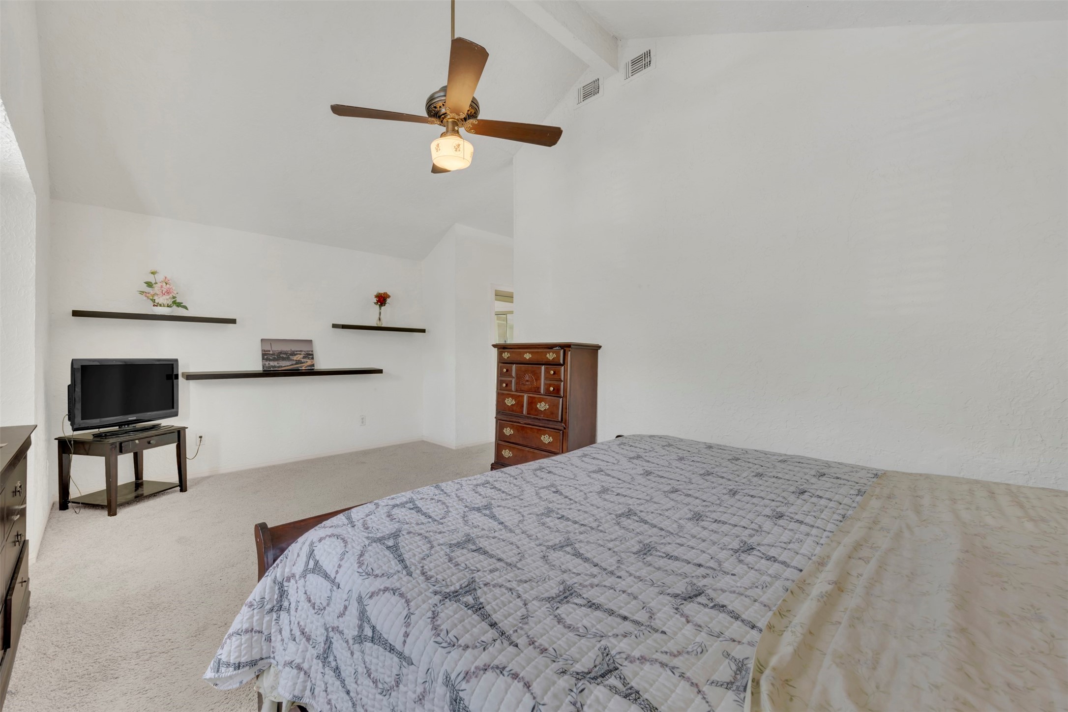 15619 Beechnut Street Houston, TX 77083 - Photo 26 of 29 Peaceful and airy owner’s suite offering plenty of room for a sitting area or reading nook.