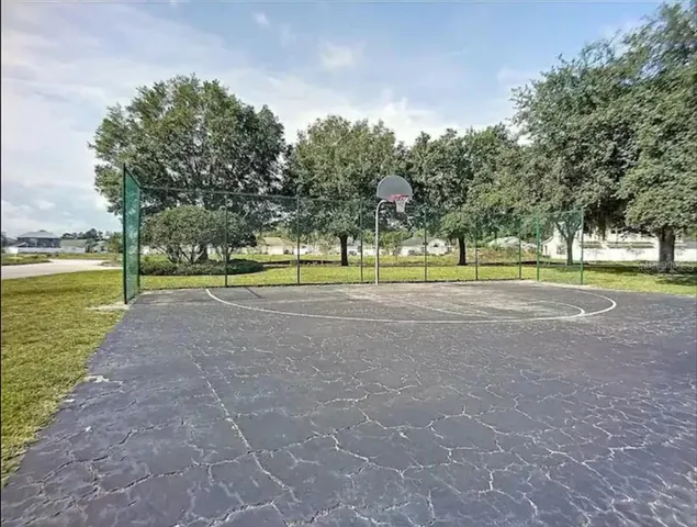 a view of a golf course with a lake
