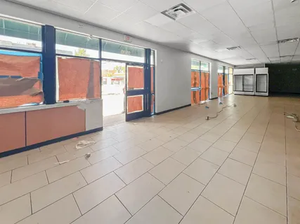 a view of a building with a street