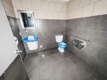 a view of an empty room with a empty space and windows