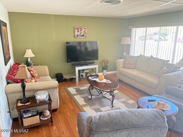 5731 West Flying M Street Tucson, AZ 85713 - Photo 6 of 20 a living room with furniture and a flat screen tv
