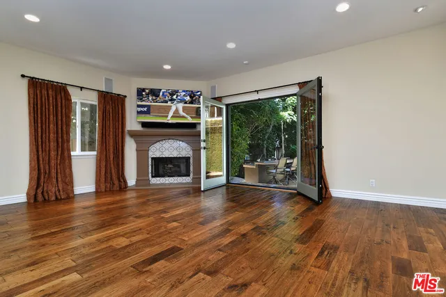 a bathroom with a sink vanity and mirror