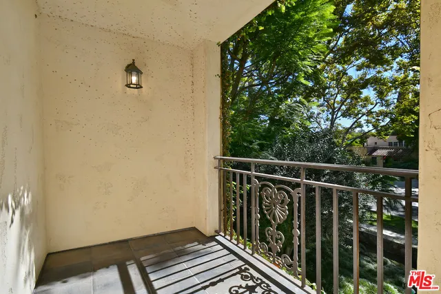 a bathroom with a sink vanity and mirror