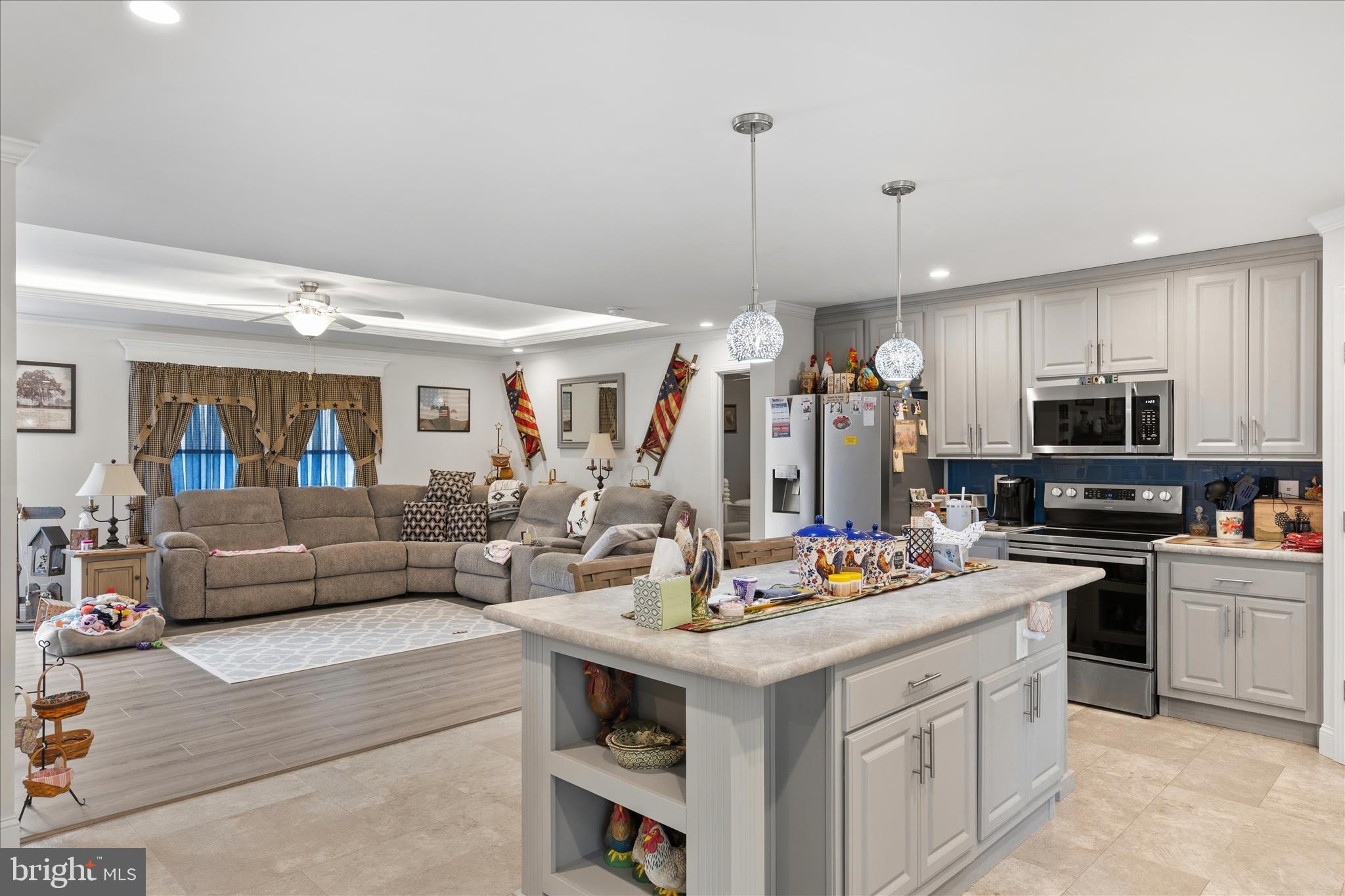 21933 Conrail Road Seaford, DE 19973 - Photo 22 of 35 a kitchen view with living room stainless steel appliances and living room view